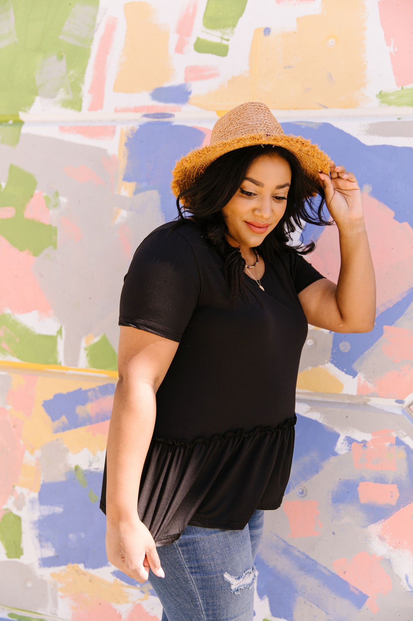Ruffled Peplum Top In Black