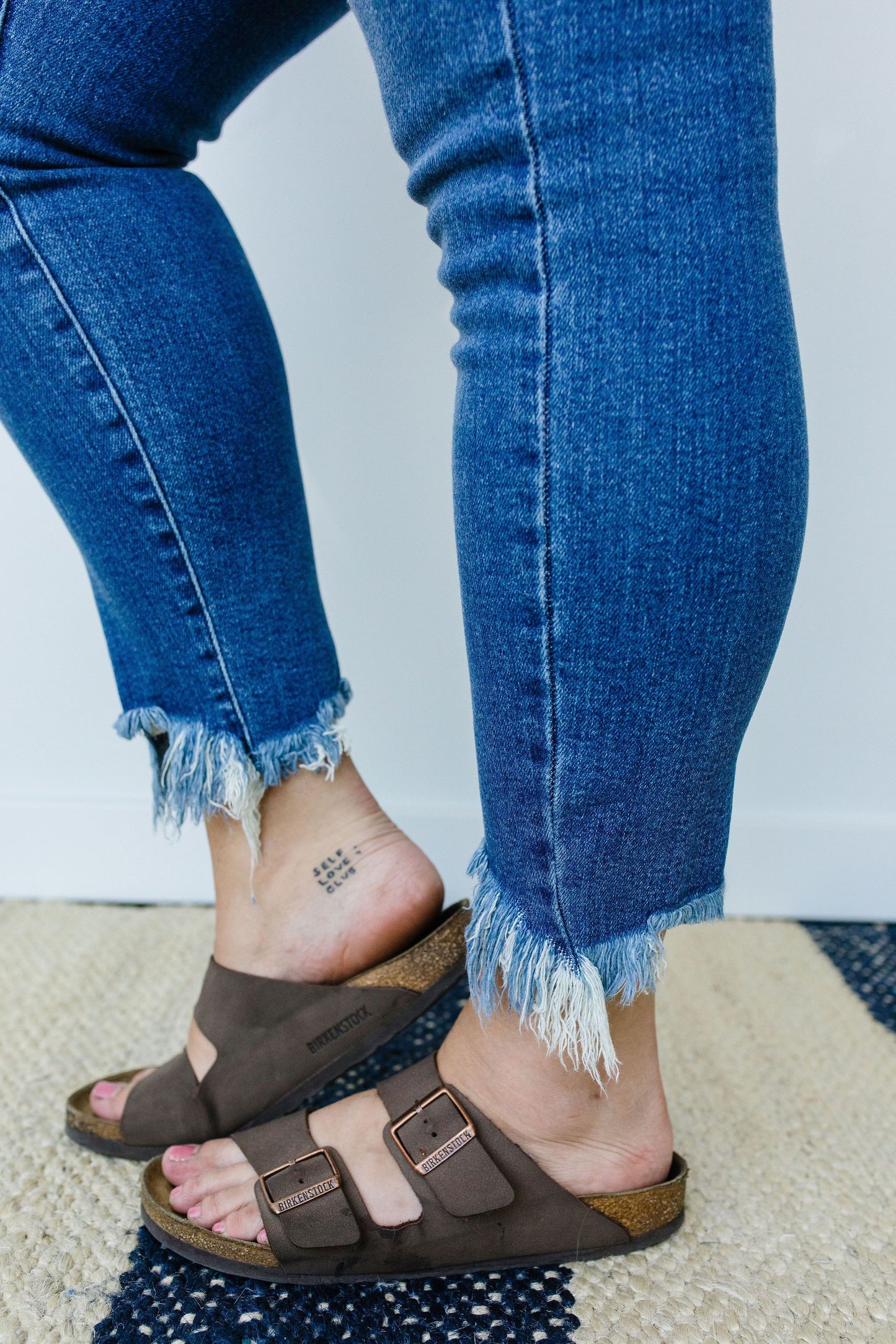 Shark Bite Frayed Hem Jeans