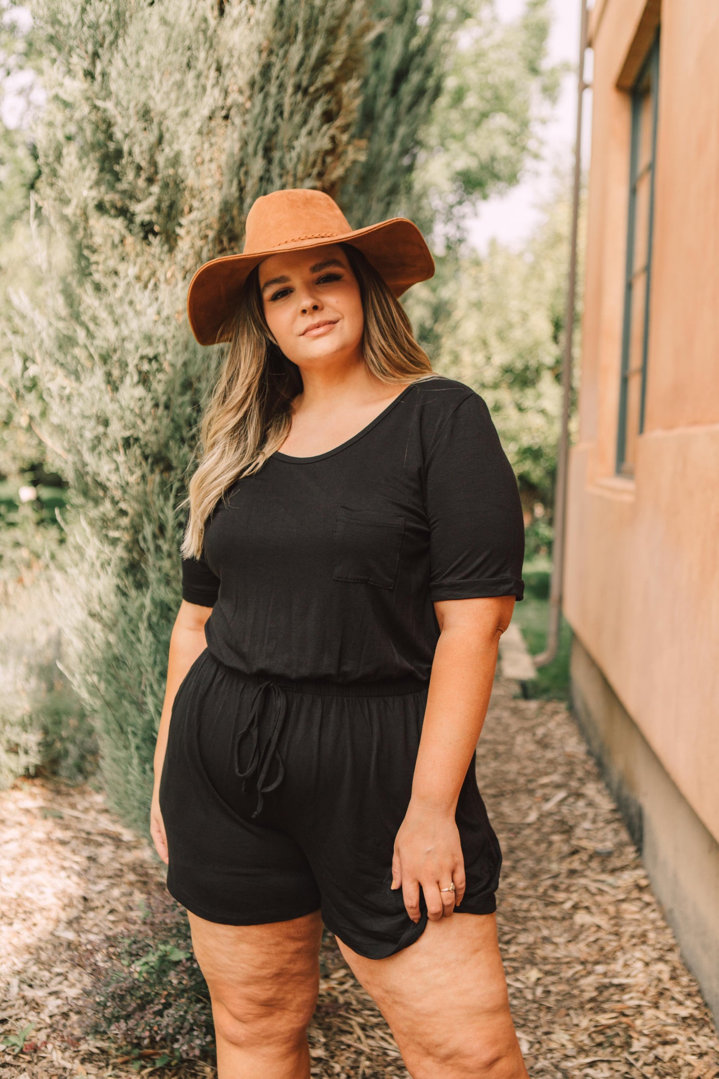 From Romp To Rest Romper In Black
