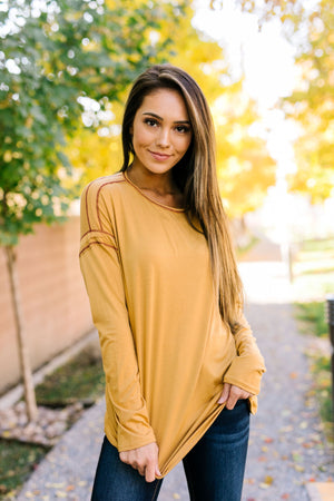 Beyond Compare Contrast Stitch Top In Mustard - ALL SALES FINAL