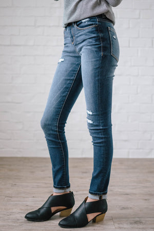Distressed Mid Rise Skinny Jean