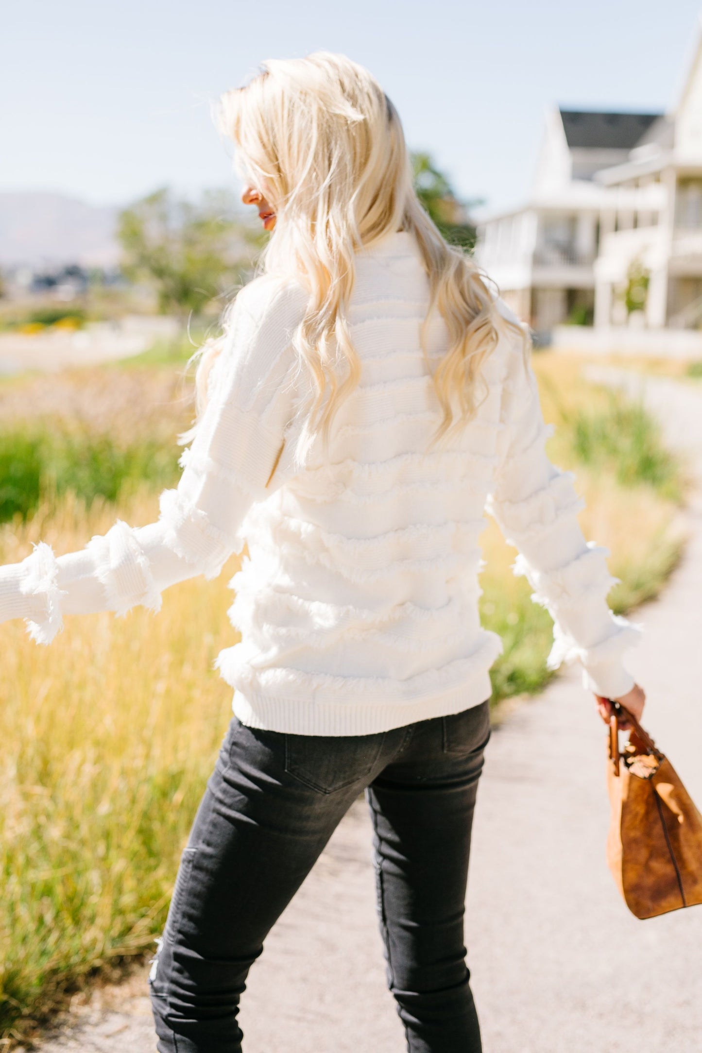 Layers Of Fringe Sweater